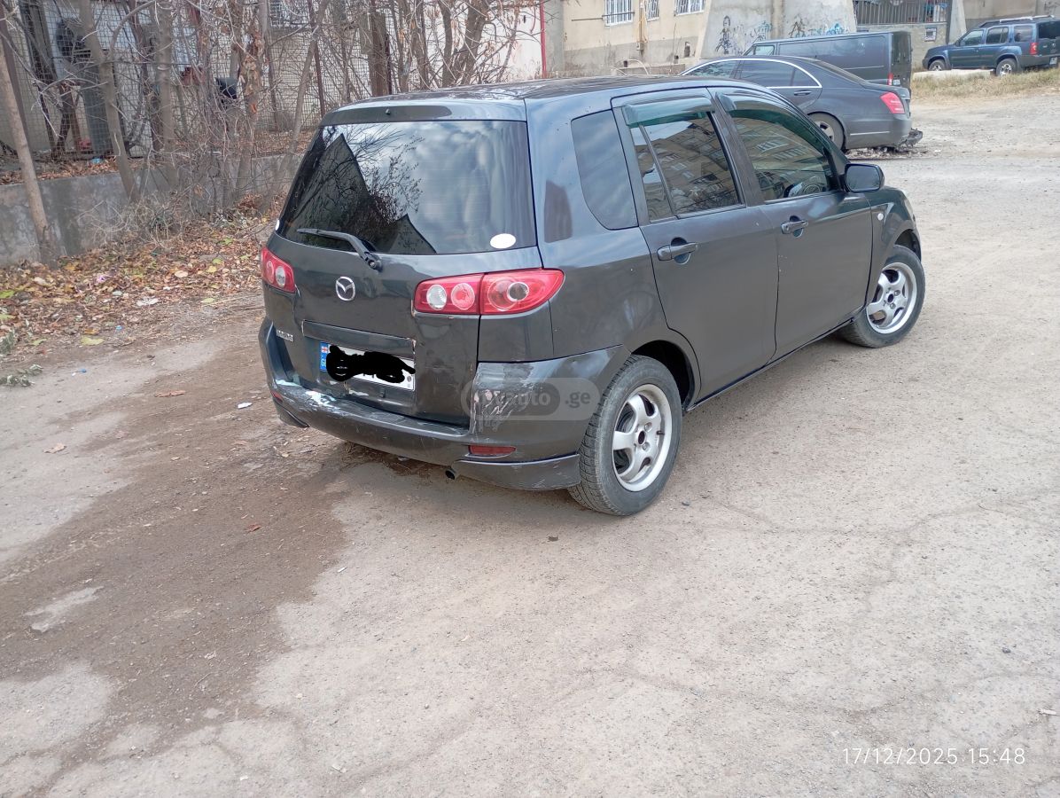 Mazda Demio 2005 — photo 2