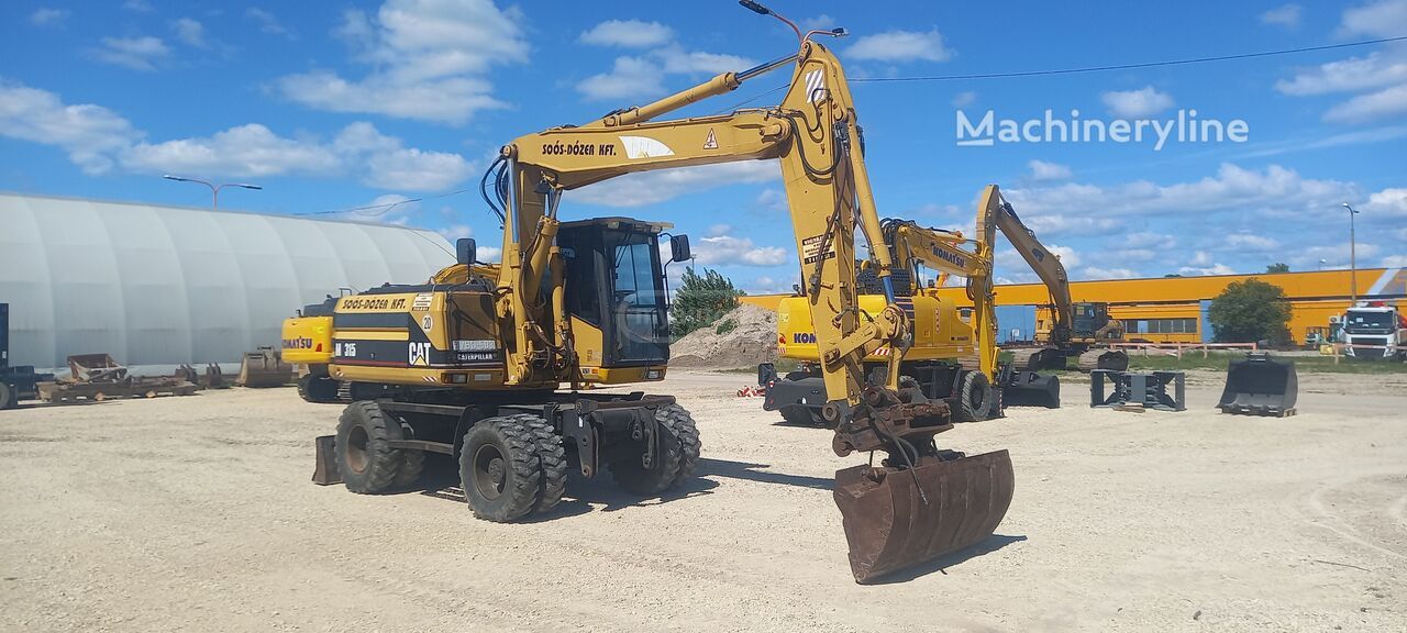 Caterpillar 120 / 120 AWD 2000 — photo 2