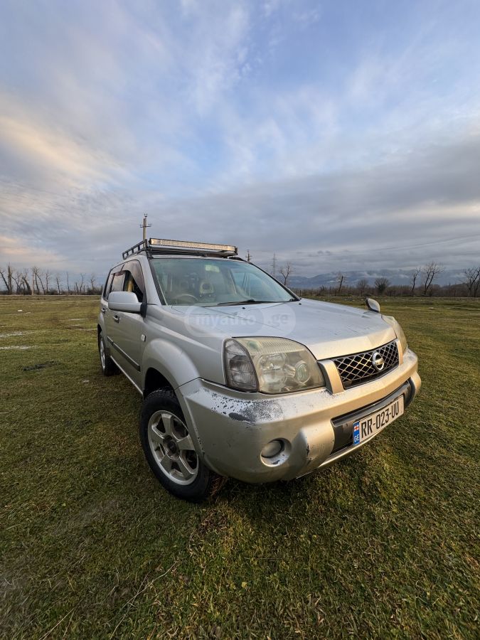 Nissan X-Trail 2004 — photo 2