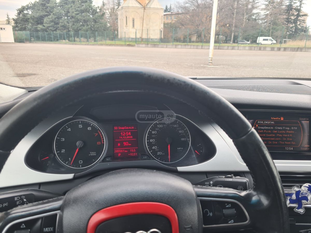 Audi A4 2009 — photo 2