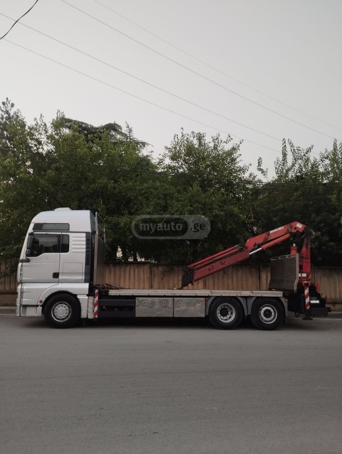 Isuzu TGA 26.400 2006 — photo 2