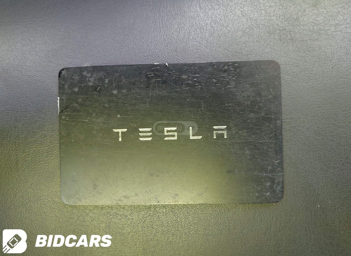 Tesla Model Y 2024 — photo 2