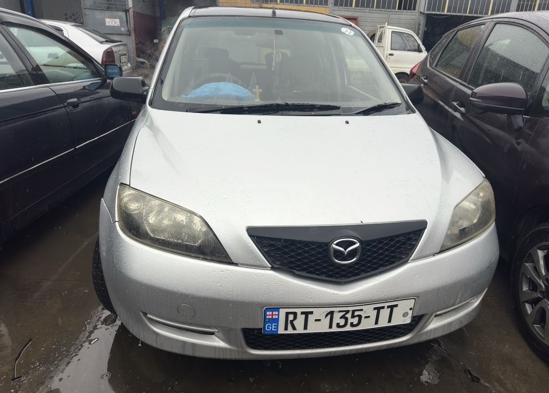 Mazda Demio 2002 — photo 2