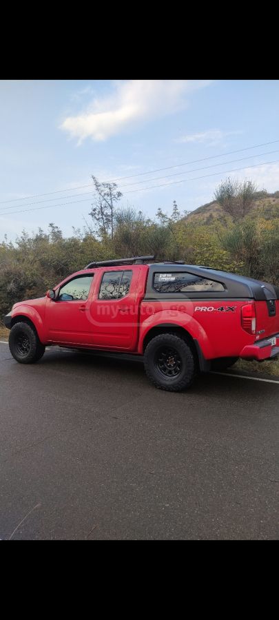 Nissan Frontier 2011 — photo 2