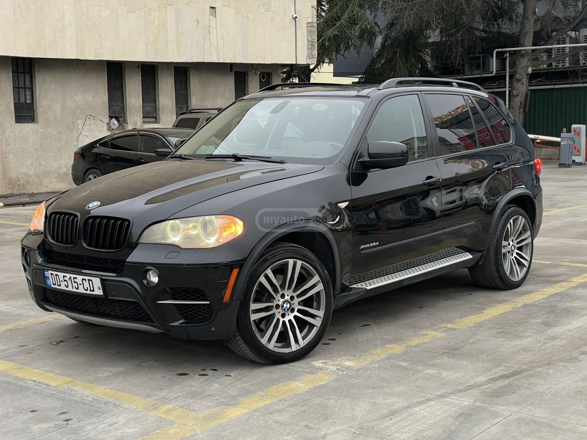 BMW X5 2009 — photo 2