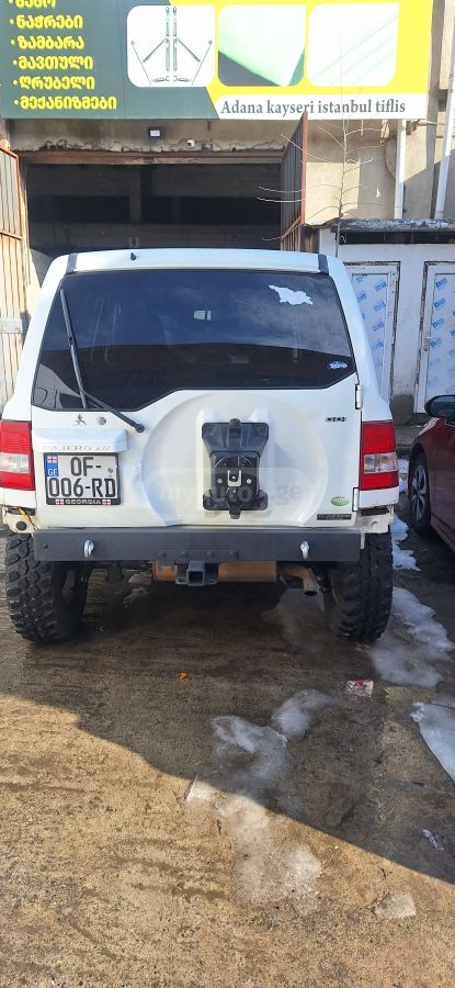 Mitsubishi Pajero IO 2004 — photo 2