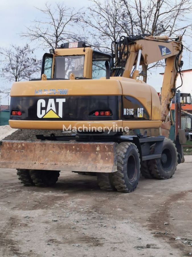 Caterpillar 120 / 120 AWD 2005 — photo 2