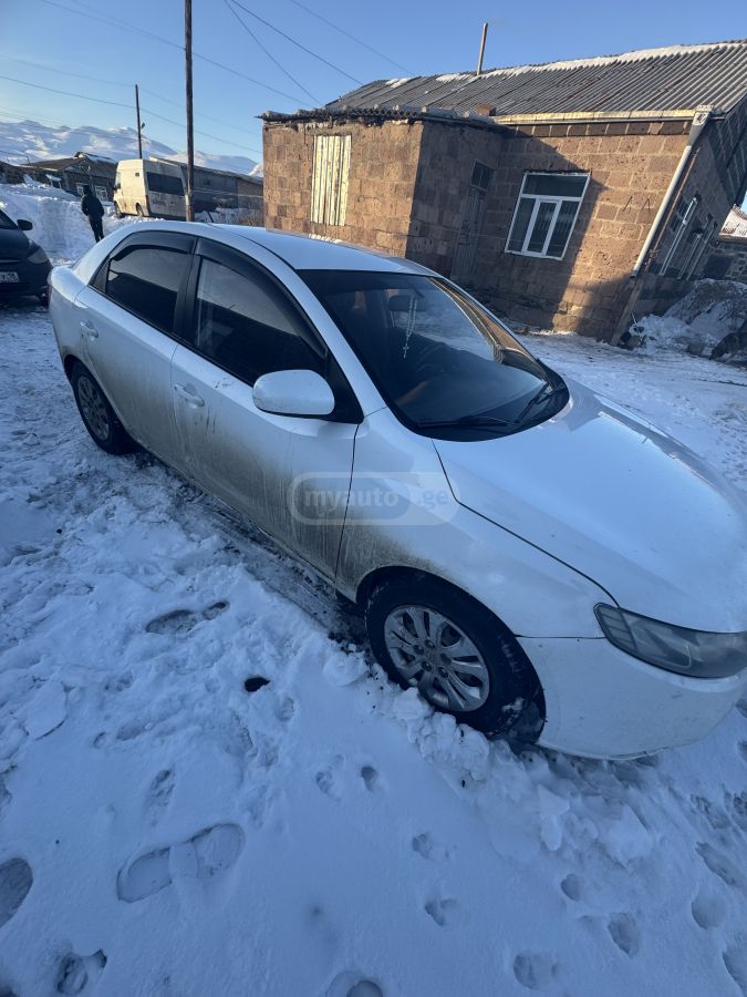 Kia Cerato 2011 — photo 2