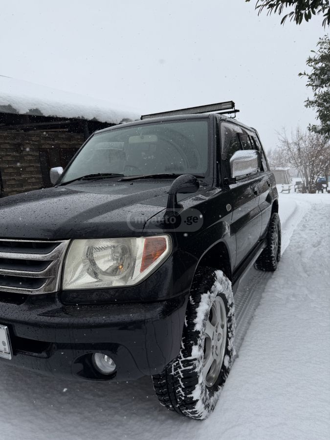 Mitsubishi Pajero IO 2007 — photo 2
