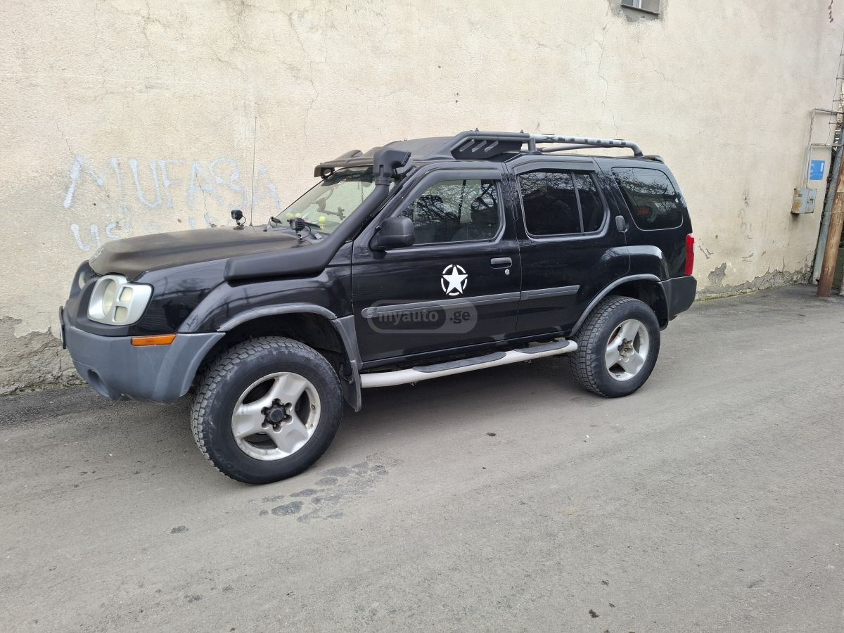 Nissan Xterra 2004 — photo 2