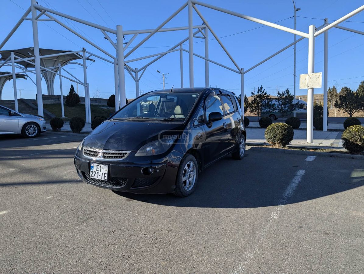 Mitsubishi Colt 2006 — photo 2