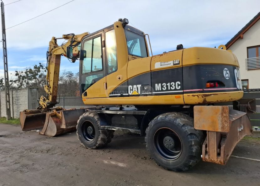 Caterpillar M313 2004 — photo 2
