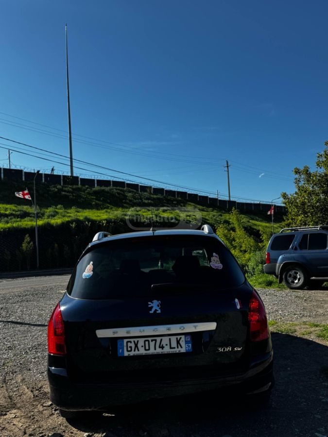 Peugeot 308 2010 — photo 2