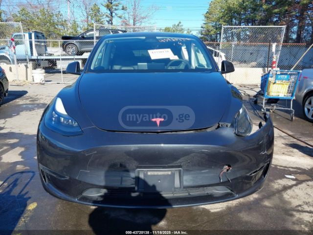 Tesla Model Y 2024 — photo 2