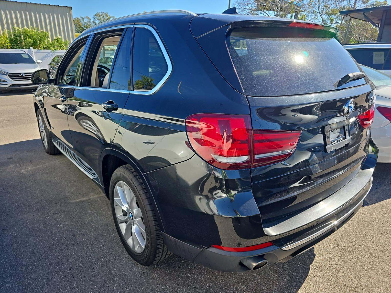 BMW X5 2014 — photo 2