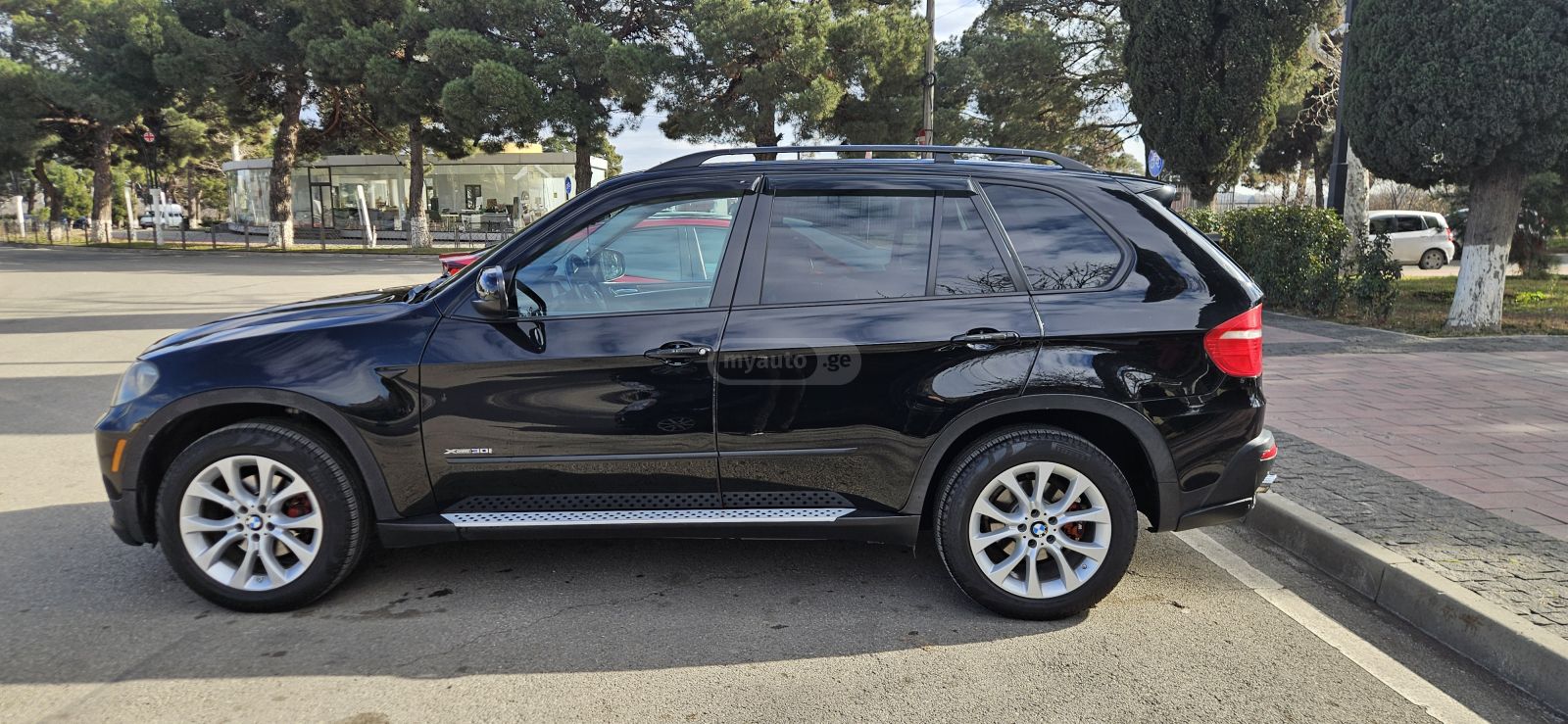 BMW X5 2009 — photo 2