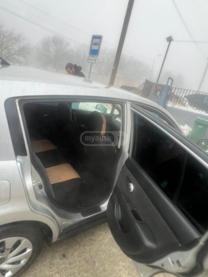Nissan Tiida 2005 — photo 2