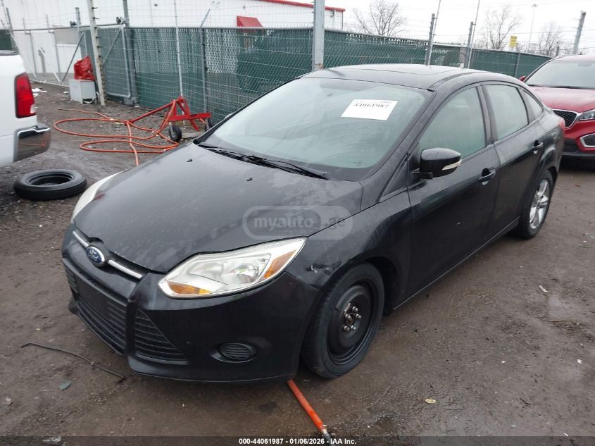 Ford Focus 2014 — photo 2