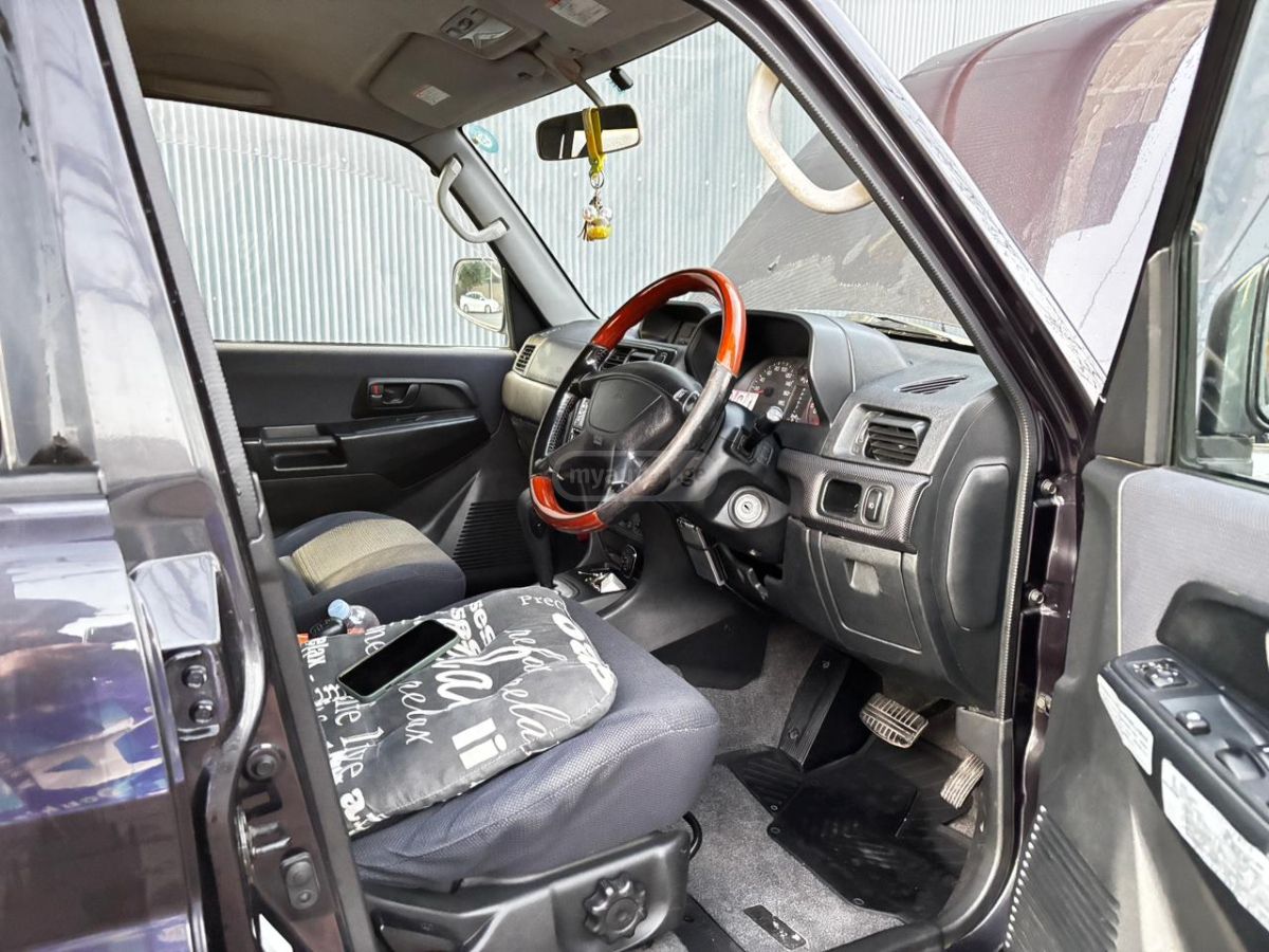 Mitsubishi Pajero IO 2001 — photo 2
