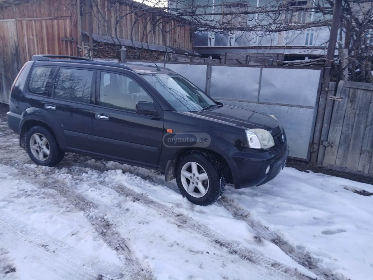 Nissan X-Trail 2004 — photo 2