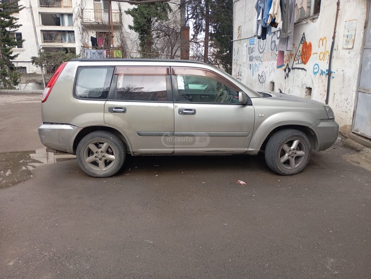 Nissan X-Trail 2003 — photo 2