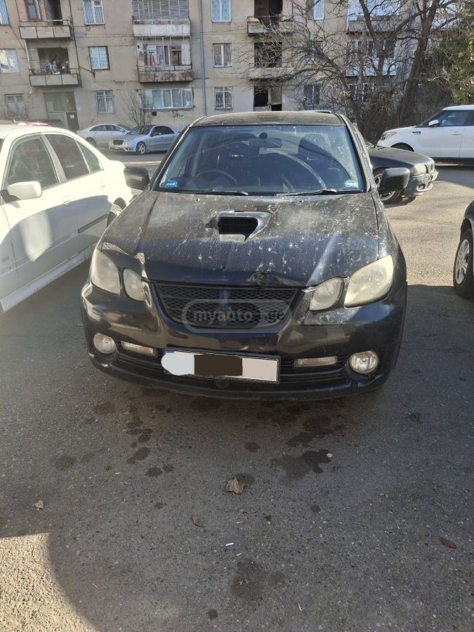 Mitsubishi Airtrek 2003 — photo 2