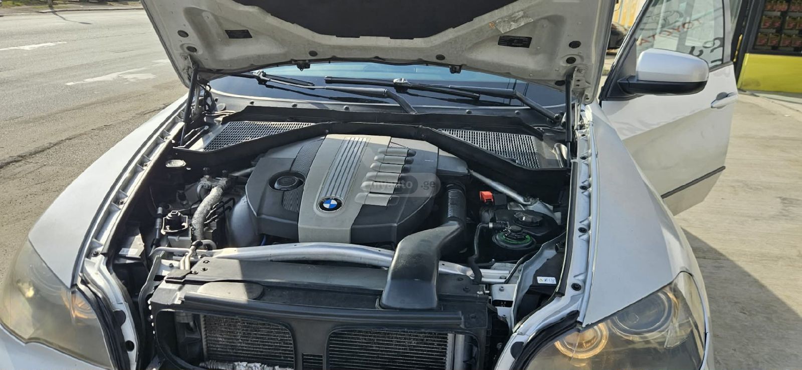 BMW X5 2009 — photo 2