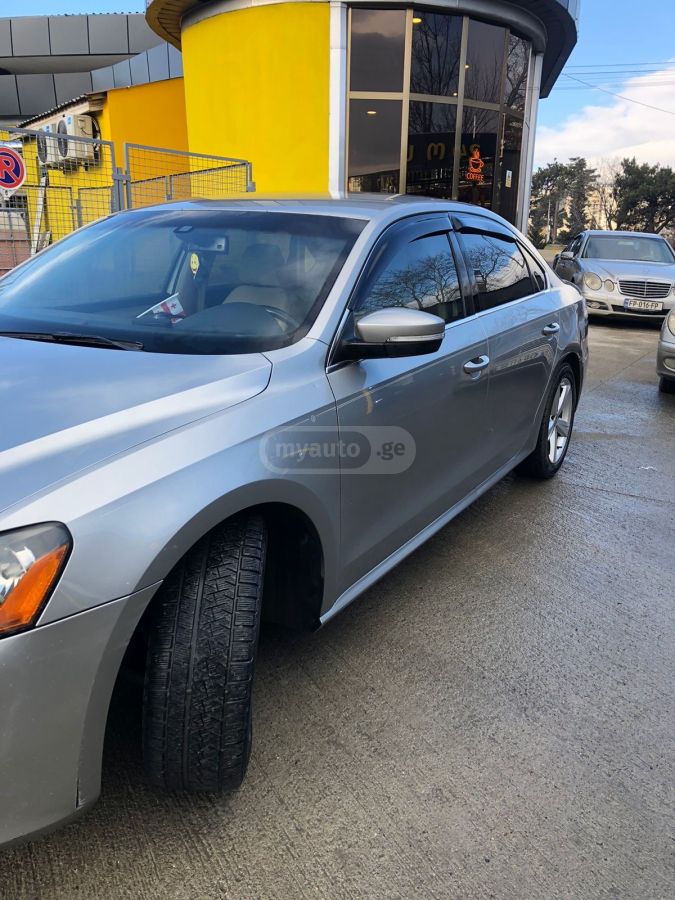Volkswagen Passat 2013 — photo 2