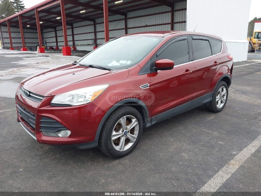 Ford Escape 2014 — photo 2