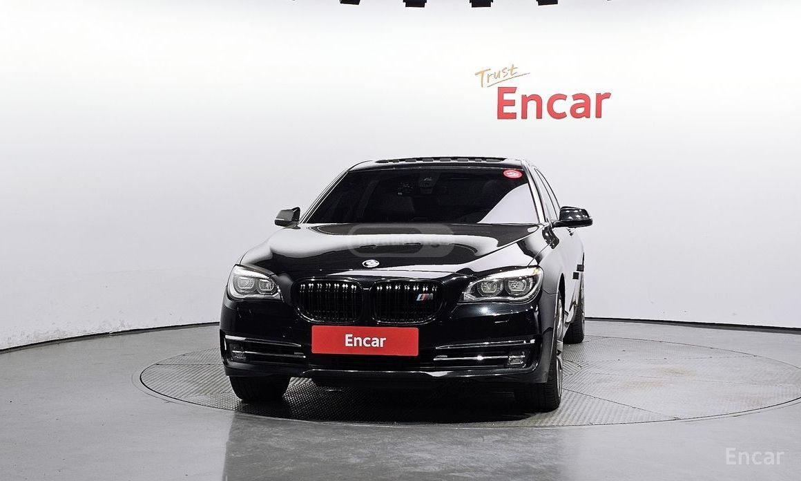 BMW 750 2015 — photo 2