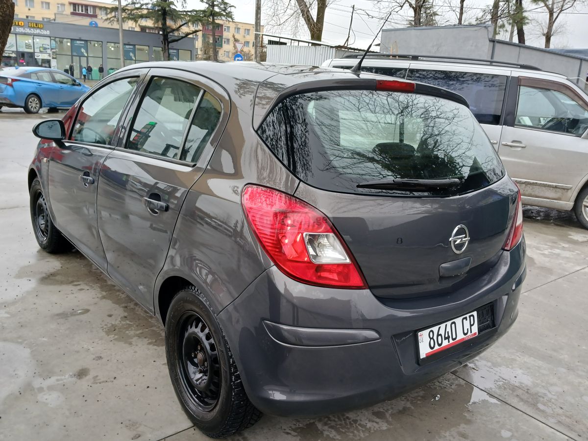Opel Corsa 2013 — photo 2