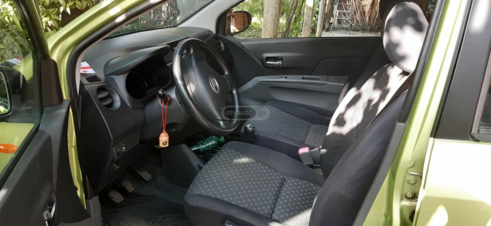 Daihatsu Cuore 2007 — photo 2