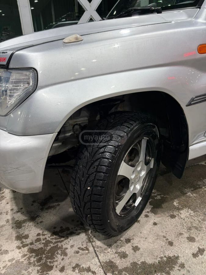 Mitsubishi Pajero IO 2002 — photo 2