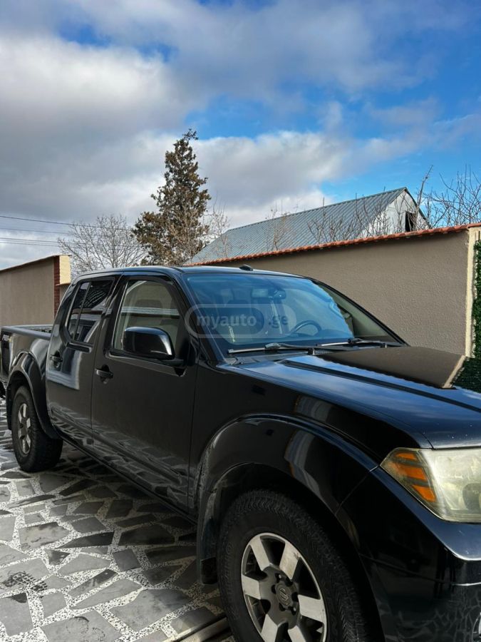 Nissan Frontier 2013 — photo 2