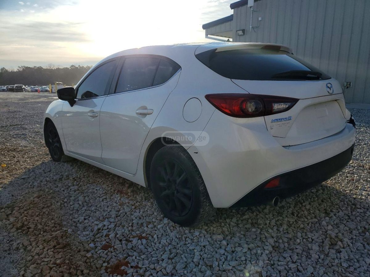 Mazda 1300 2014 — photo 2