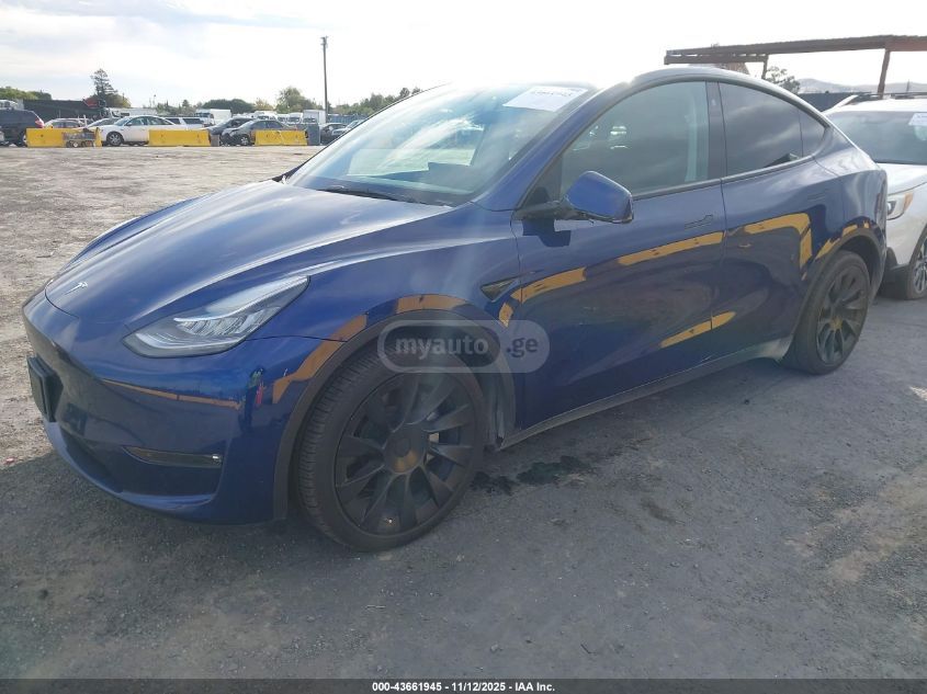 Tesla Model Y 2022 — photo 2