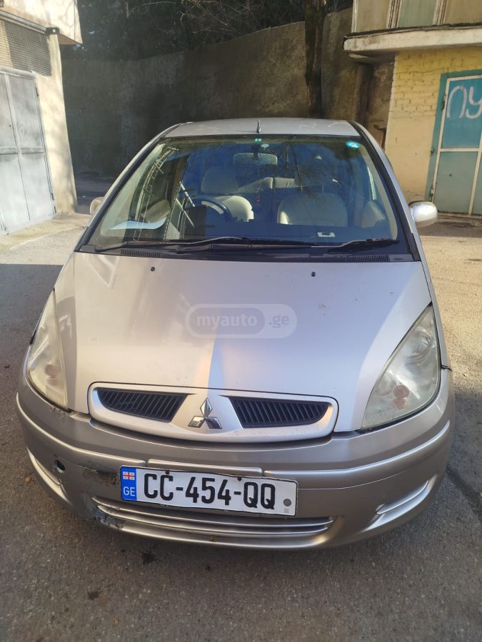 Mitsubishi Colt 2003 — photo 2