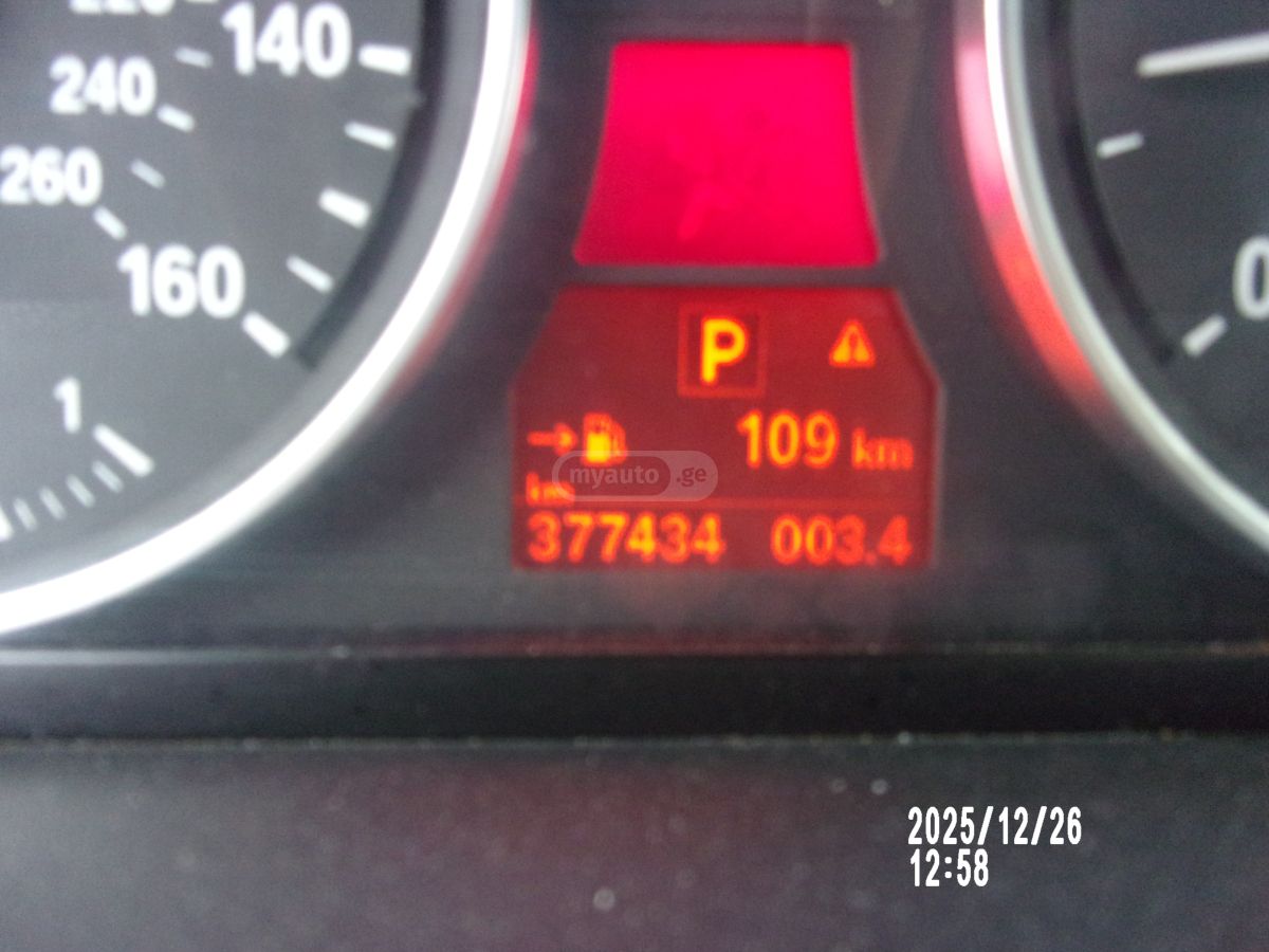 BMW X5 2009 — photo 2