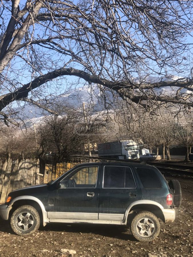 Kia Sportage 1998 — photo 2