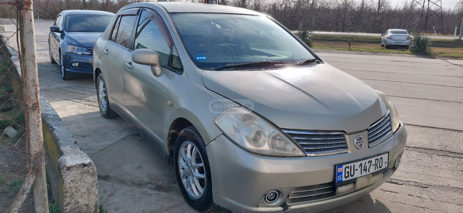 Nissan Tiida 2005 — photo 2