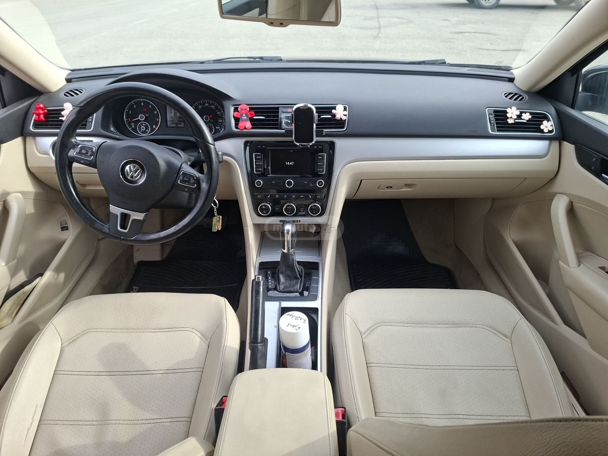 Volkswagen Passat 2013 — photo 2