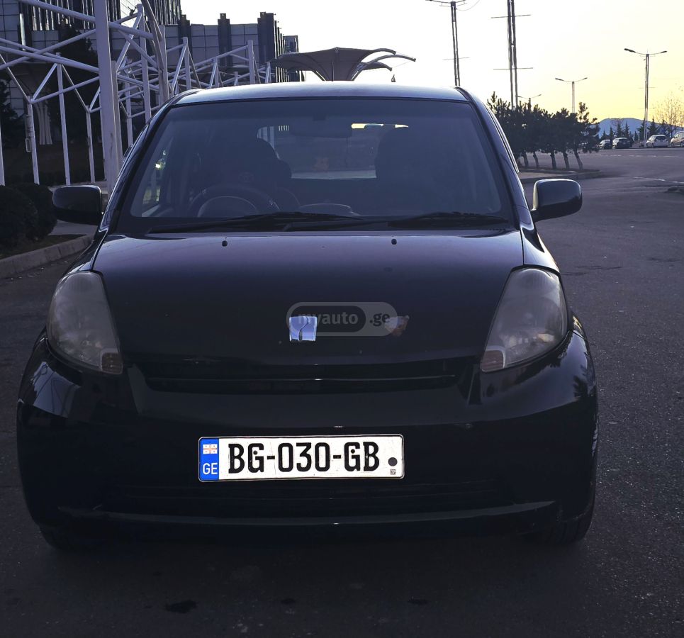 Toyota Passo 2005 — photo 2