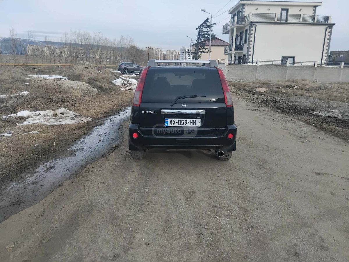 Nissan X-Trail 2006 — photo 2