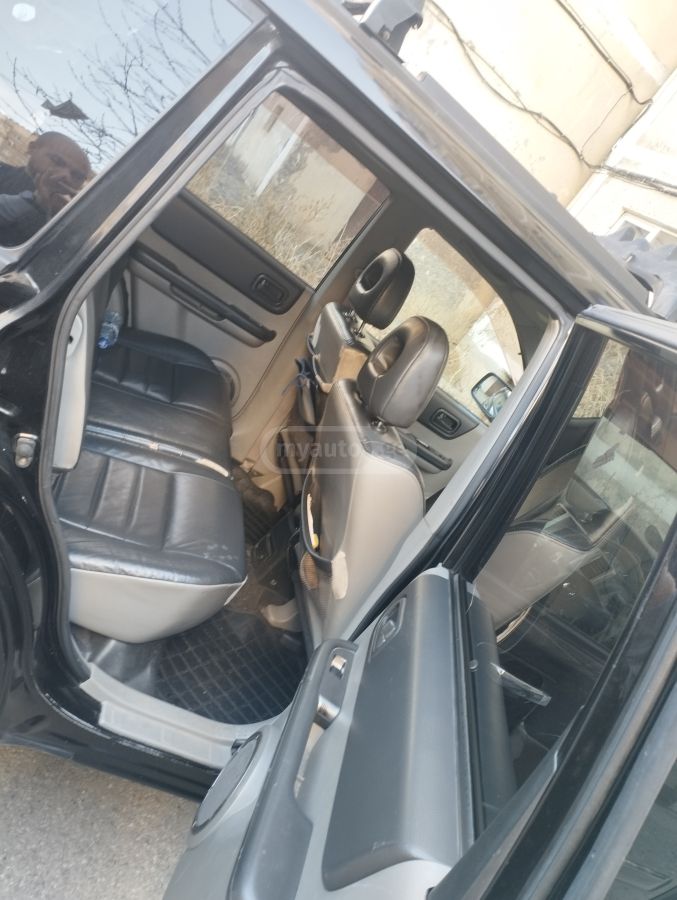 Nissan X-Trail 2004 — photo 2