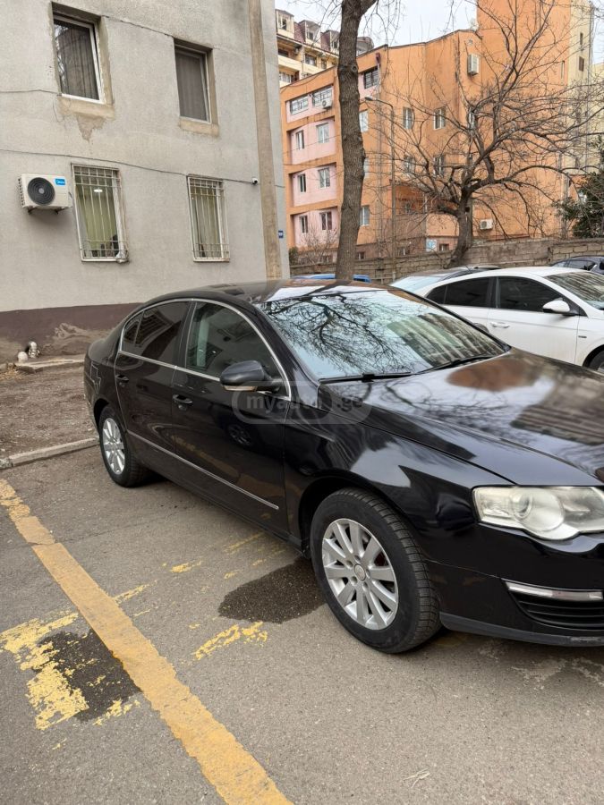 Volkswagen Passat 2009 — photo 2