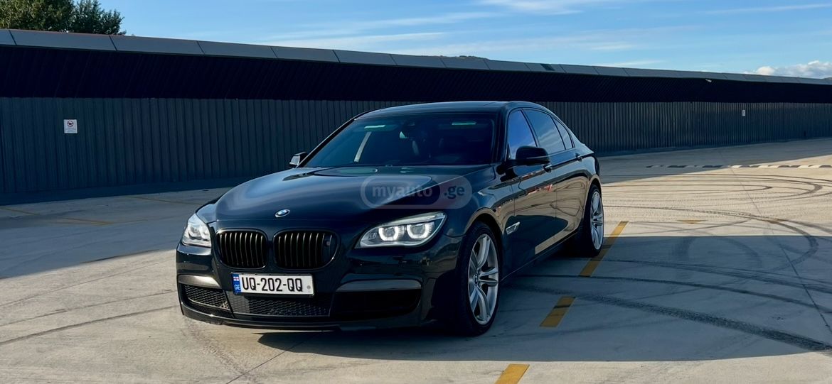 BMW 750 2014 — photo 2
