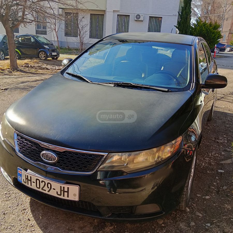 Kia Forte 2011 — photo 2