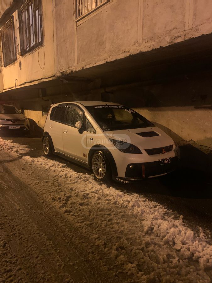 Mitsubishi Colt 2006 — photo 2