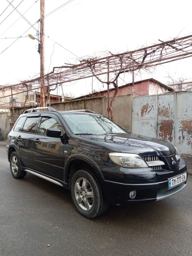 Mitsubishi Airtrek 2004 — photo 2