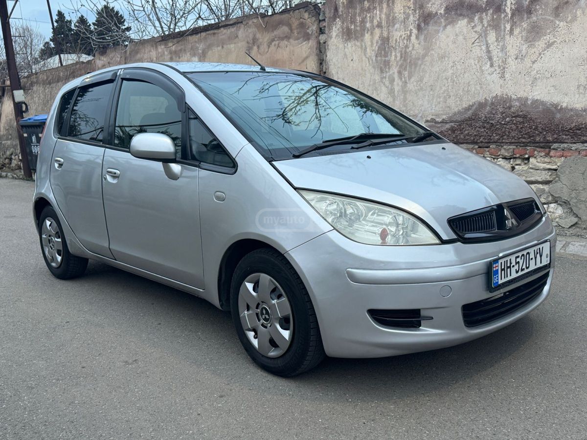 Mitsubishi Colt 2003 — photo 2